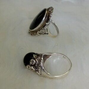 Two vintage silver rings with black inlays